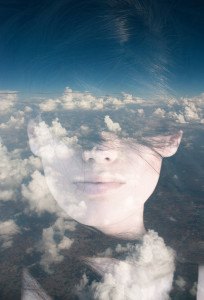 Dream like surreal double exposure portrait of attractive lady c
