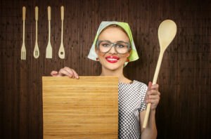 Funny Rural Woman Cook Holding Ladle And Chopping Shim, Close-up